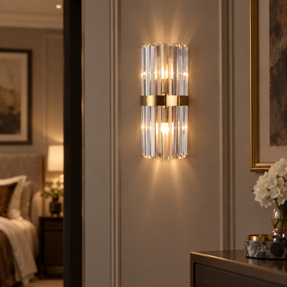 Crystal wall light sconce glowing in a hallway