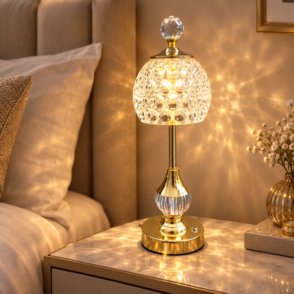 Crystal touch table lamp on a bedside table