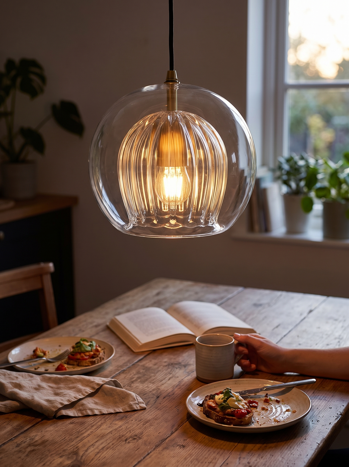 LuxeSphere Ribbed Glass Pendant Light in a lifestyle setting